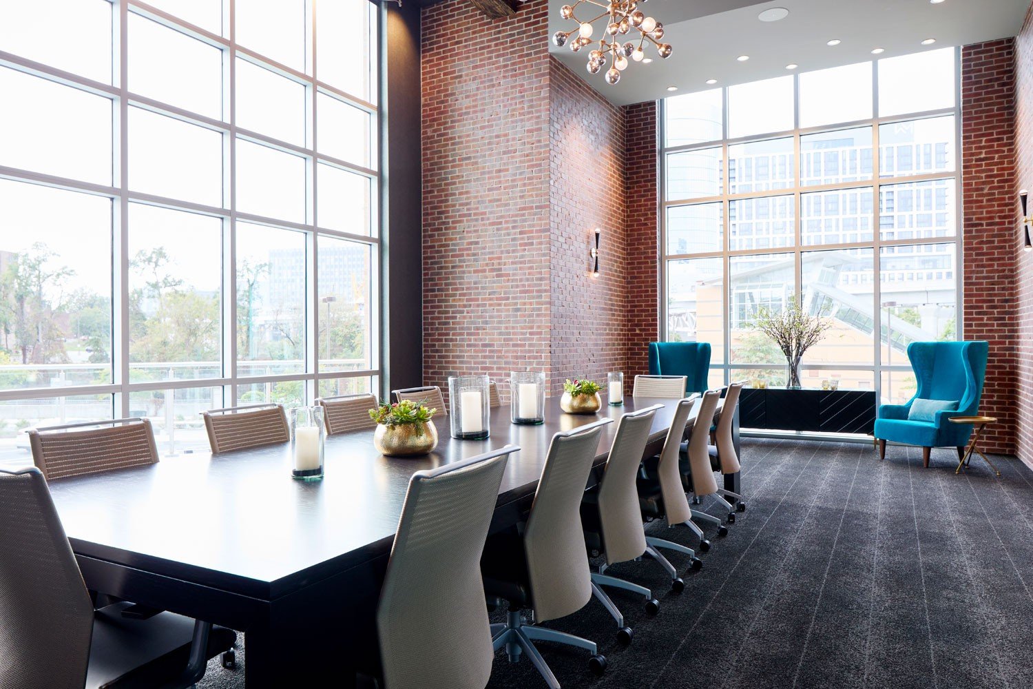 Archer Hotel Tysons - Boardroom table with floor to ceiling windows